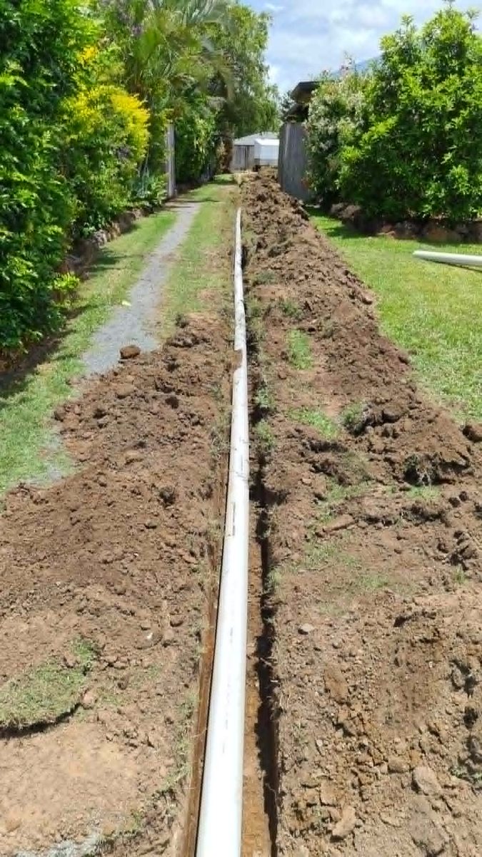 Long stormwater pipe run laid along a path